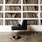 A collection of vinyl records on shelfs.